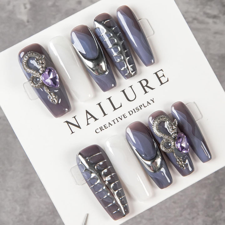Artistic Sculpted Nail Set with Metallic Accents
