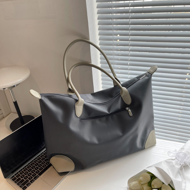 Large travel bag with durable material and multiple compartments Stornfield