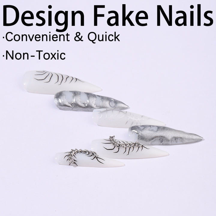 Creative nail art set with elegant floral designs and metallic accents Stornfield