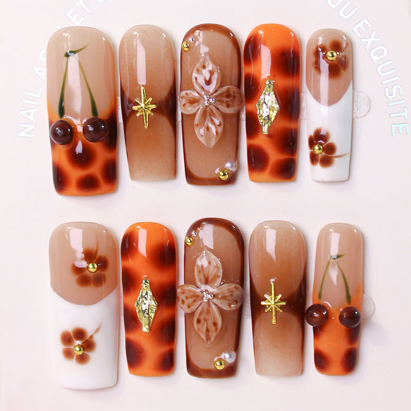 Acrylic nail set with luxurious decorations and stylish accents Stornfield