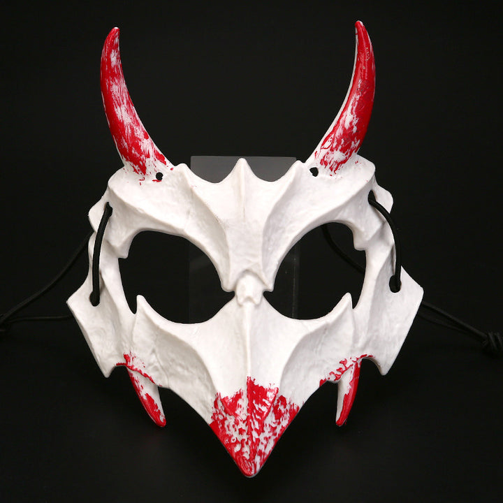 Half-face mask with flashing vampire teeth and adjustable rubber band