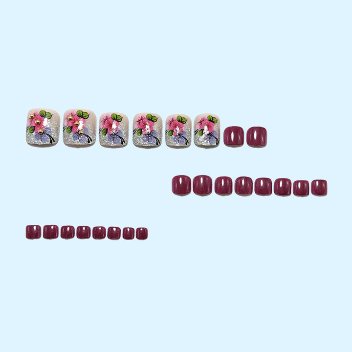 Artificial nails with floral motifs and glitter accents Stornfield