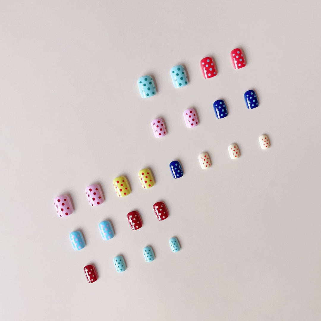 Artificial nail set with colorful dots and cheerful designs Stornfield