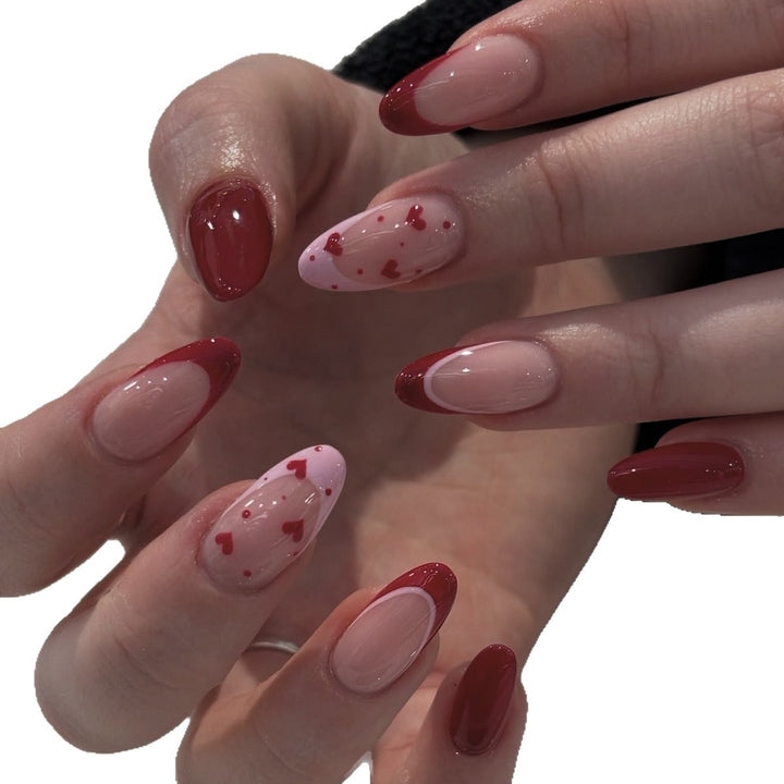 Artificial nail set with elegant heart accents and shine Stornfield