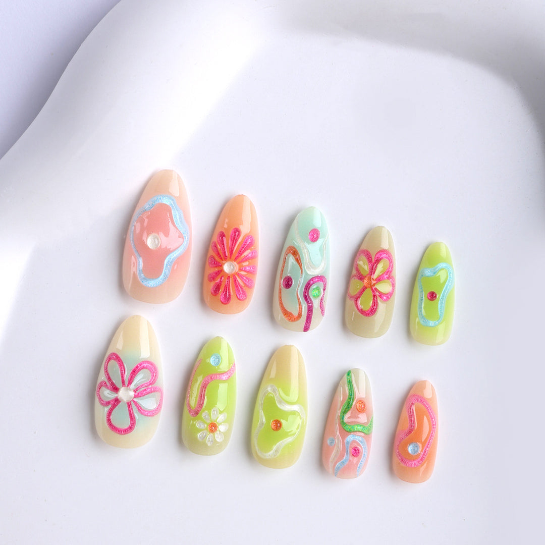 Artificial nails in the creative flower and foil design Stornfield