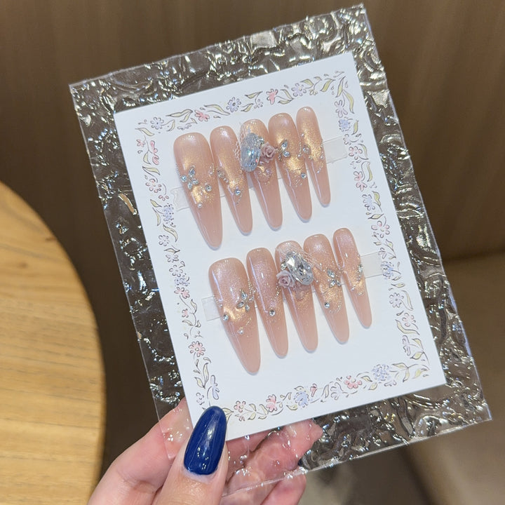 Artificial nails with romantic floral and glitter details Stornfield