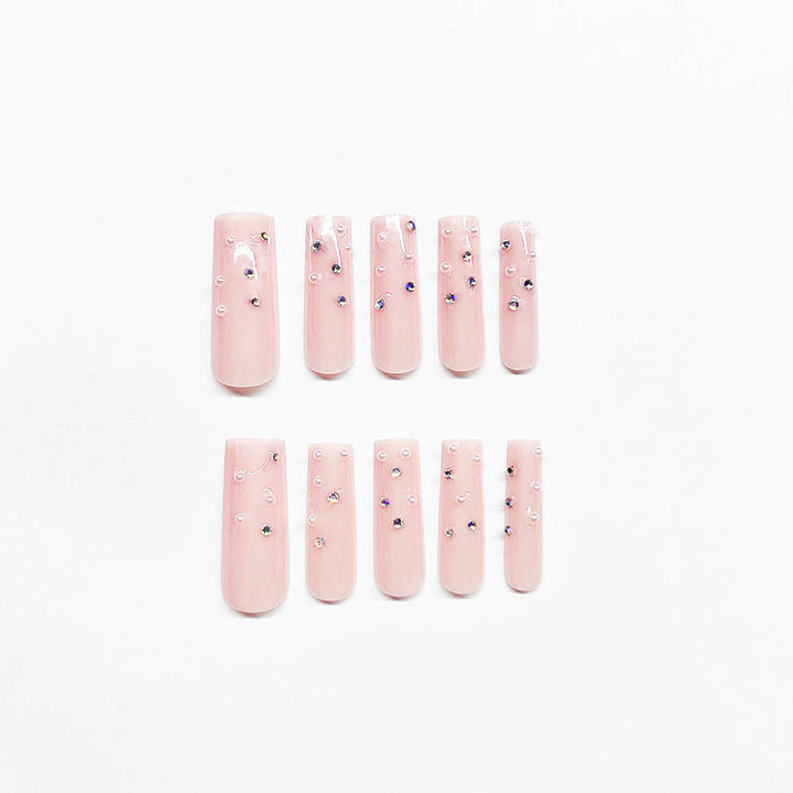 Acrylic nail set with sparkling rhinestone embellishments Stornfield