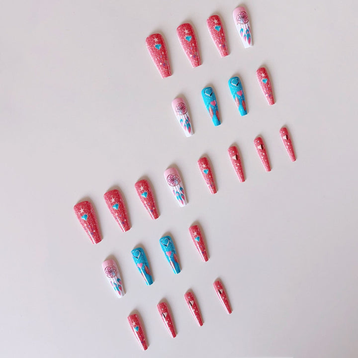 Artificial nail set with stunning 3D designs and glitter accents Stornfield