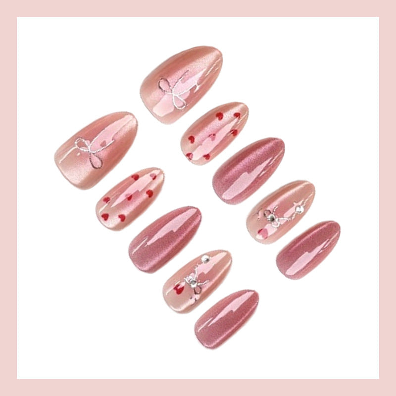Nail art set with romantic hearts and elegant bows Stornfield