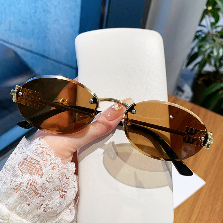 Ladies fashionable sunglasses in elegant oval design Stornfield