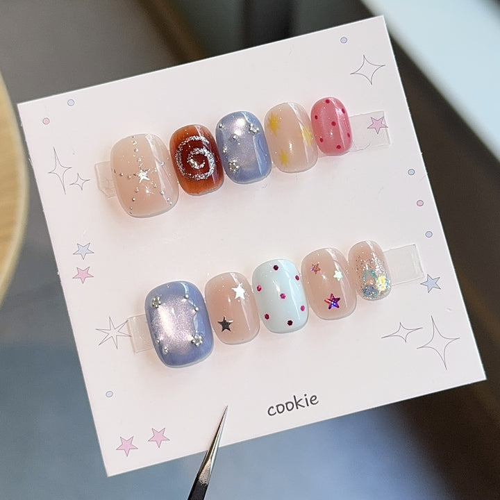 Creative artificial nails with sparkling star patterns Stornfield