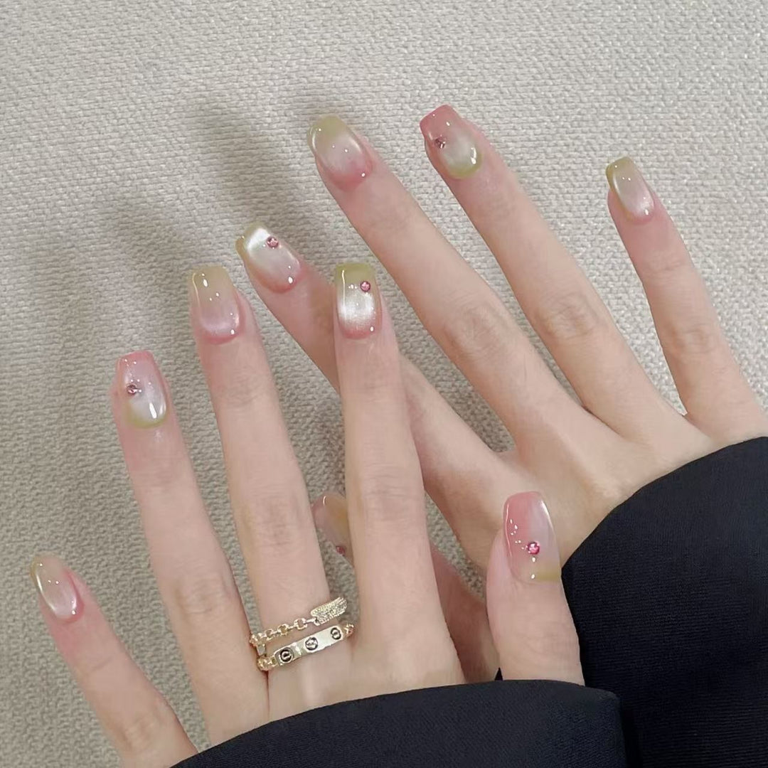 Artificial artificial nails with elegant ombre effects and glitter accents Stornfield