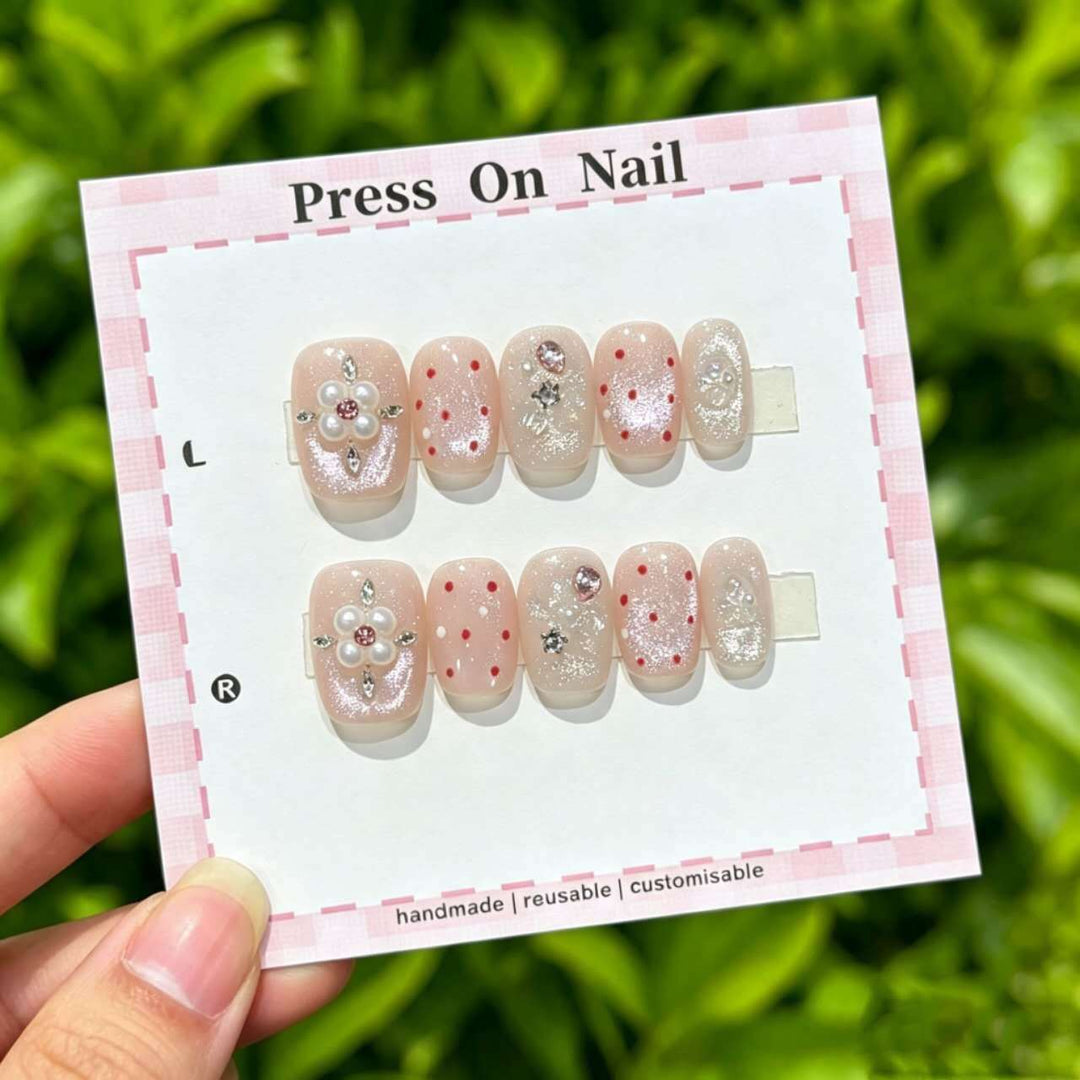 Decorative Press-On Nail Set with Floral and Shimmer Accents