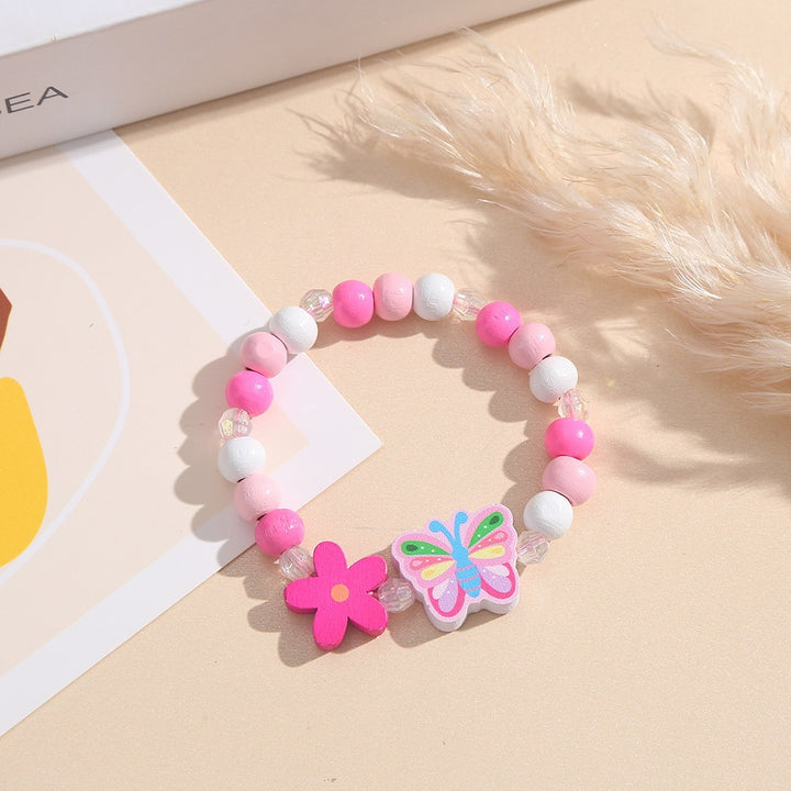 Playful bracelet with heart and butterfly charms Stornfield