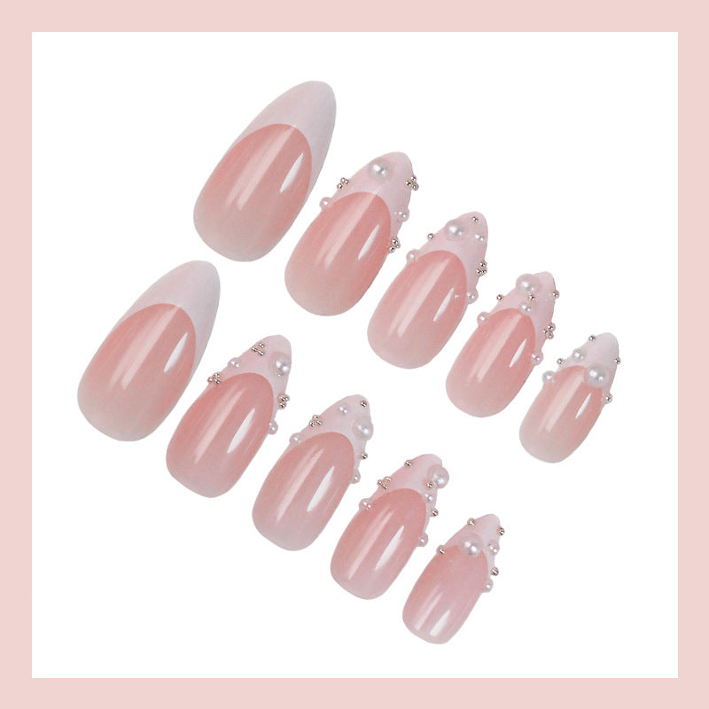 Artificial nail set with elegant pearl and lace embellishments Stornfield