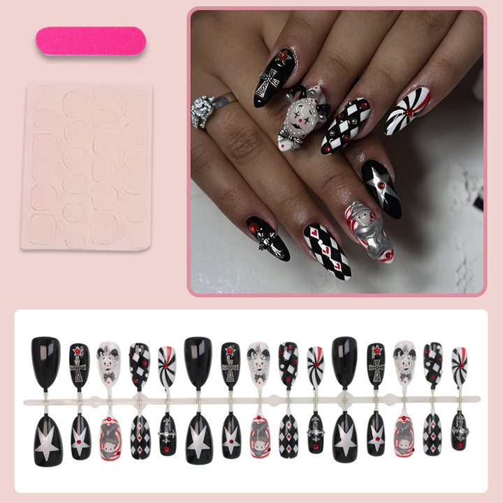 Nail art set with creative Halloween motifs and elegant accents Stornfield
