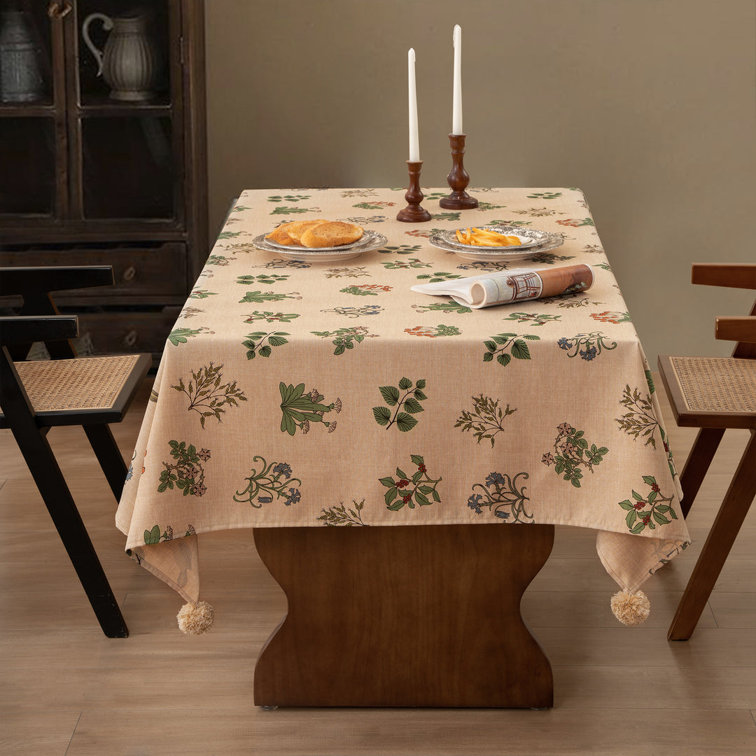 Woven tablecloth with ethnic Aztec pattern and pompom tassels