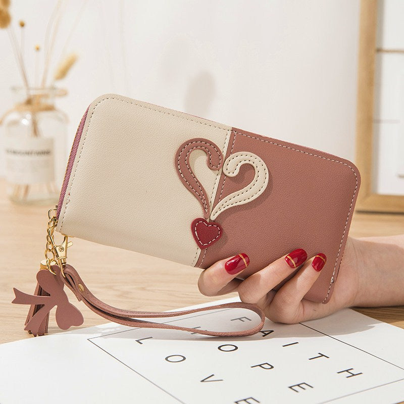 Stylish wallet with heart appliqués Stornfield