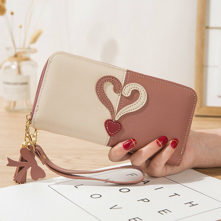 Stylish wallet with heart appliqués Stornfield