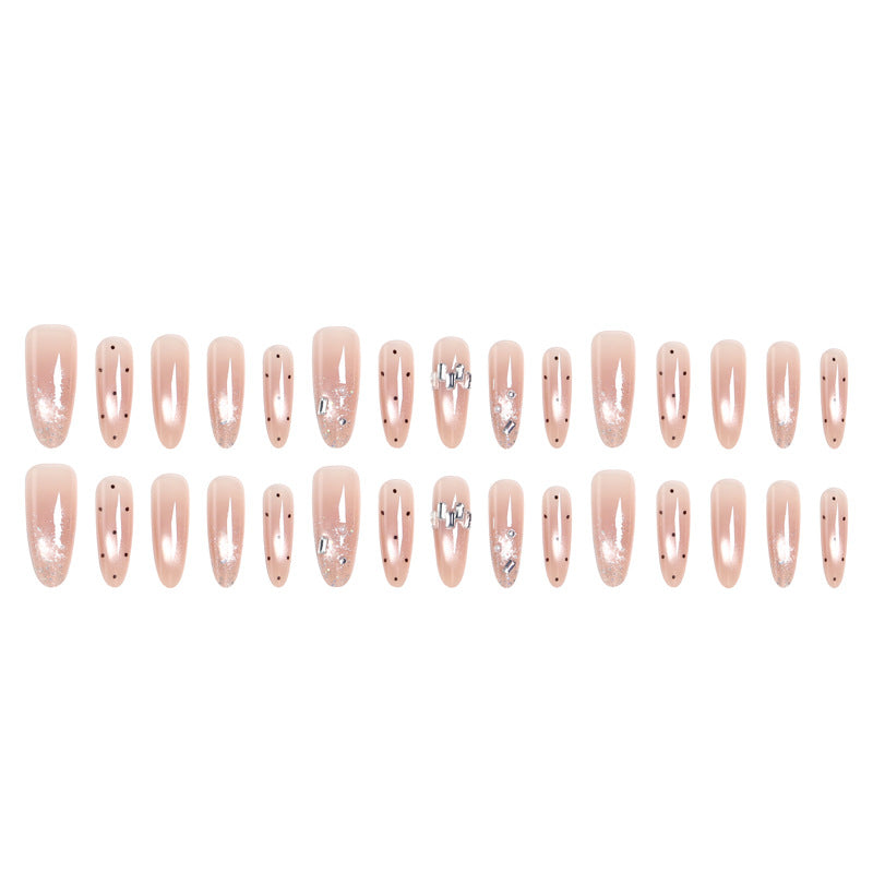Artificial nail set with sparkling glitter and elegant jewelry details Stornfield