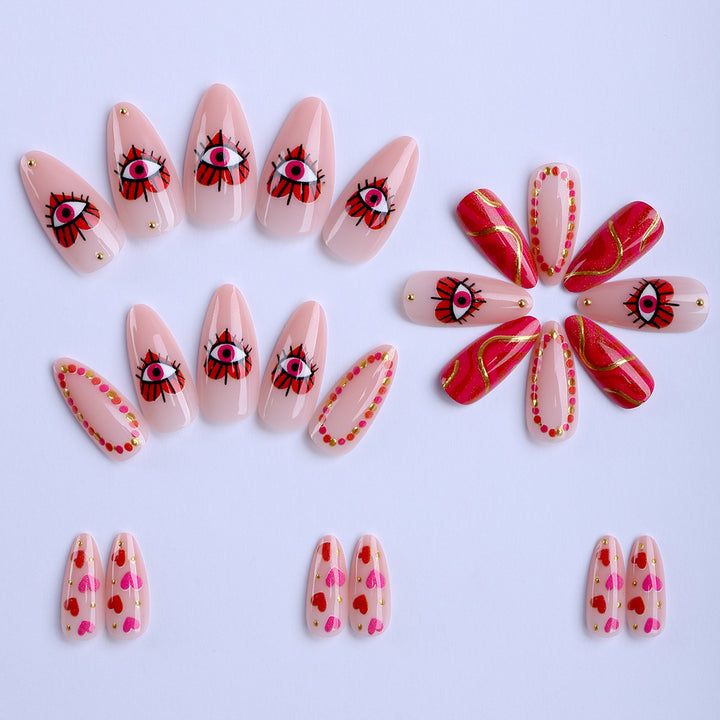 Creative heart and eye designs artificial nails Stornfield