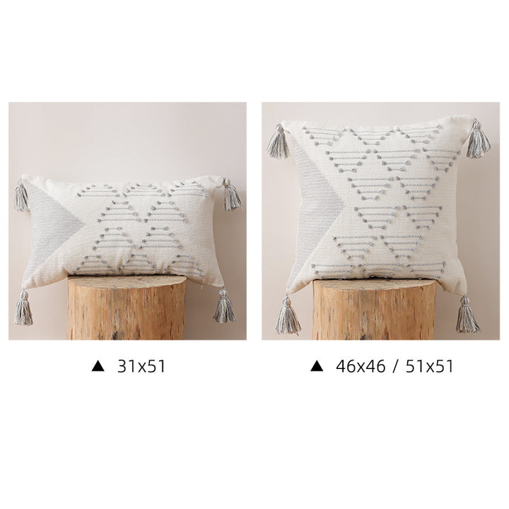 Woven decorative cushion cover with geometric tuft pattern, tassels and concealed zipper