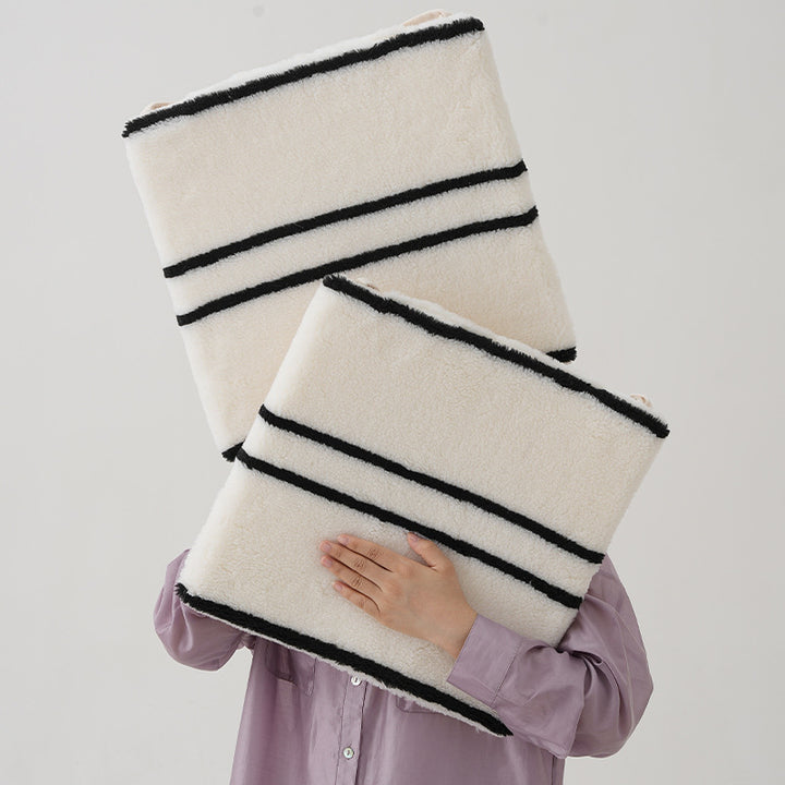 Reversible seat cushion made of teddy plush with non-slip bottom and contrast stripes Stornfield