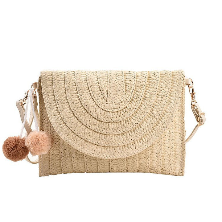 Braided shoulder bag with creative pom poms Stornfield