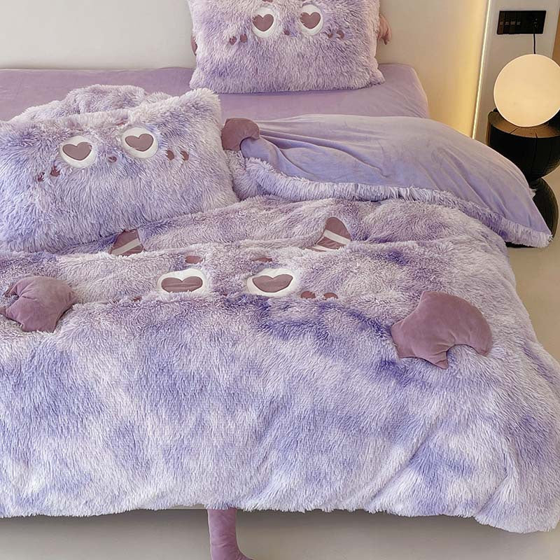 Cozy plush bedding set with 3D ears, heart-shaped eye appliqué, and extra soft microfiber fluff
