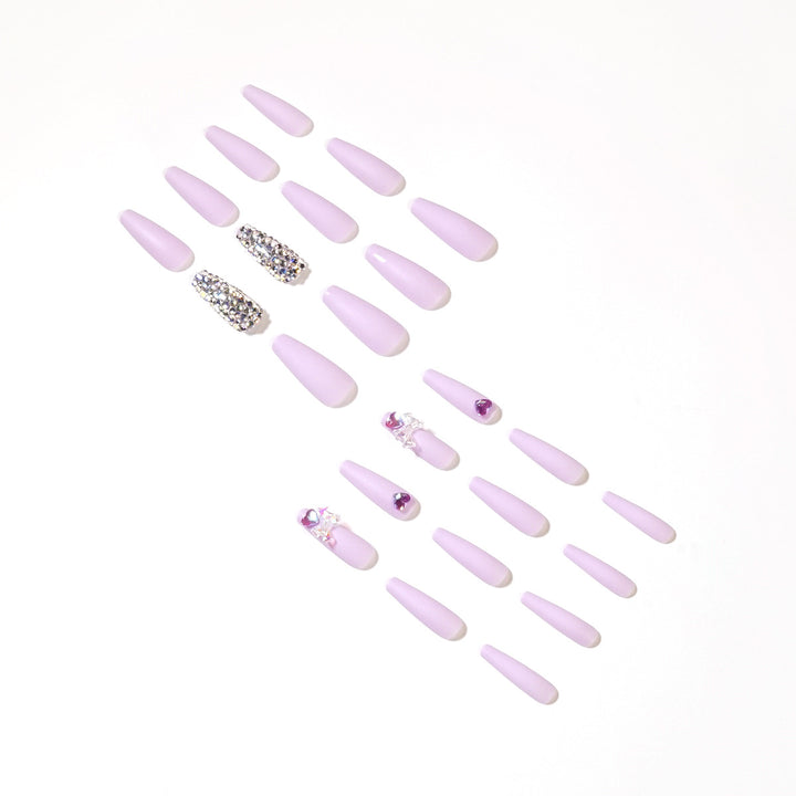 Artistic Stiletto Nails with Glitter and Flower Decorations Stornfield