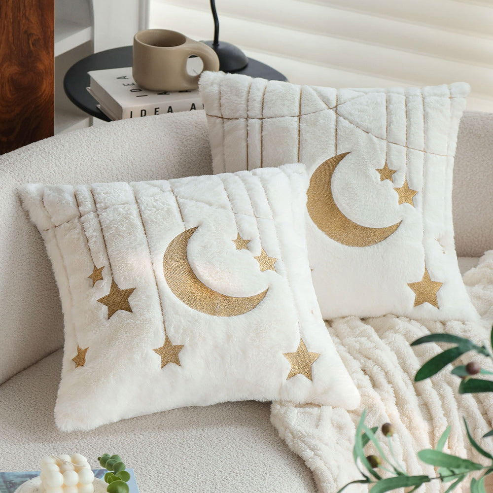 Cuddle pillow with star and moon motif