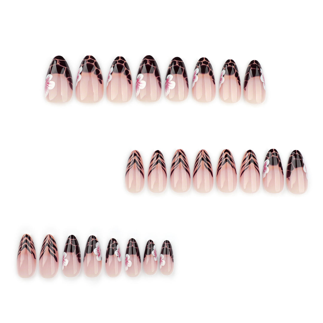 Artful Stiletto nails with floral accent Stornfield