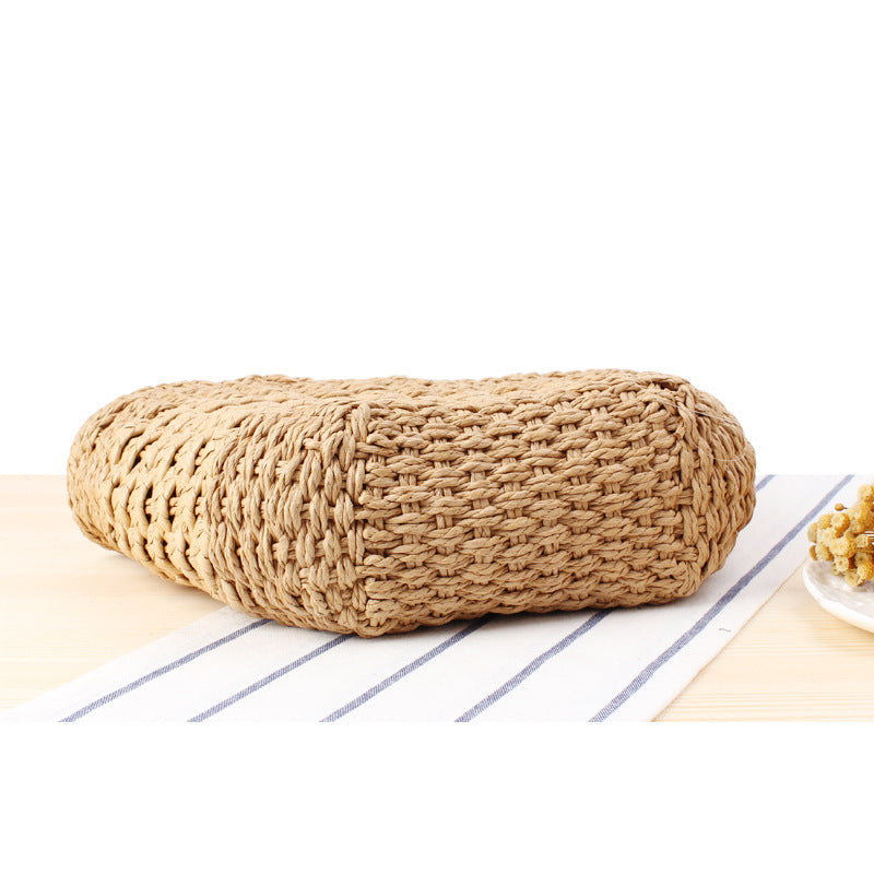 Braided handbag made of natural raffia with robust carrying straps Stornfield