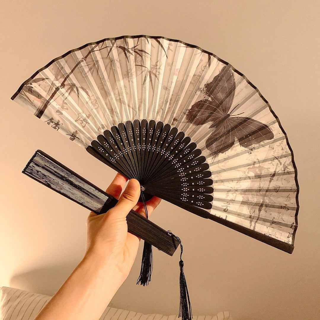 Handcrafted fan with elegant butterfly design Stornfield