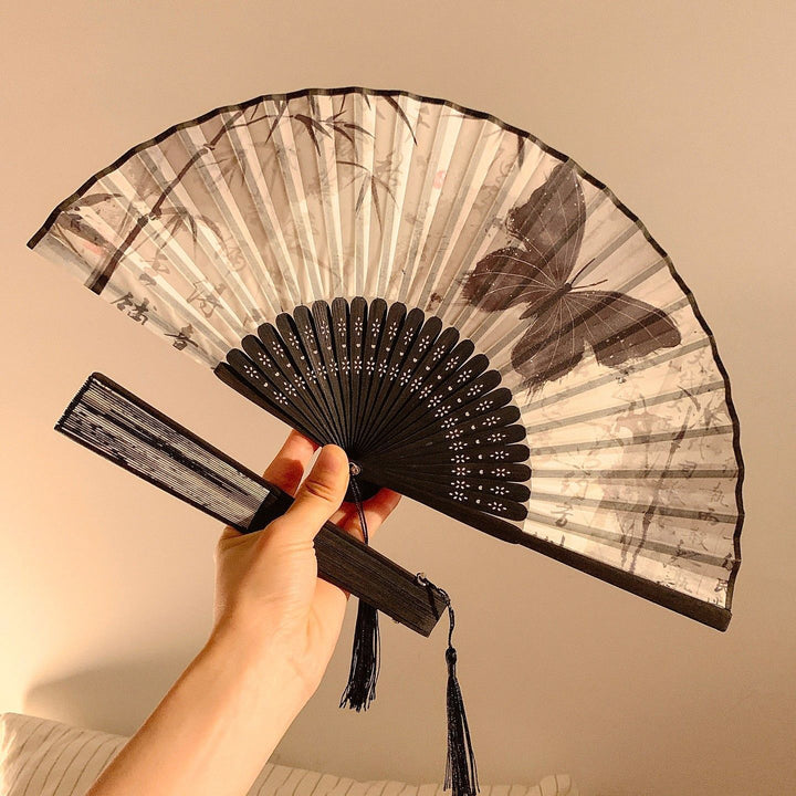 Handcrafted fan with elegant butterfly design Stornfield