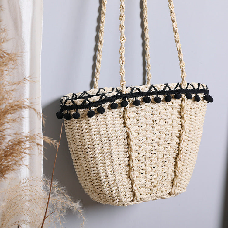 Delicate beach bag with pompons Stornfield