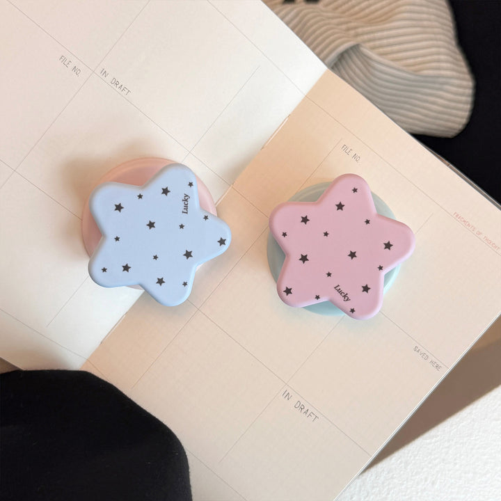Playful smartphone holder in star design Stornfield