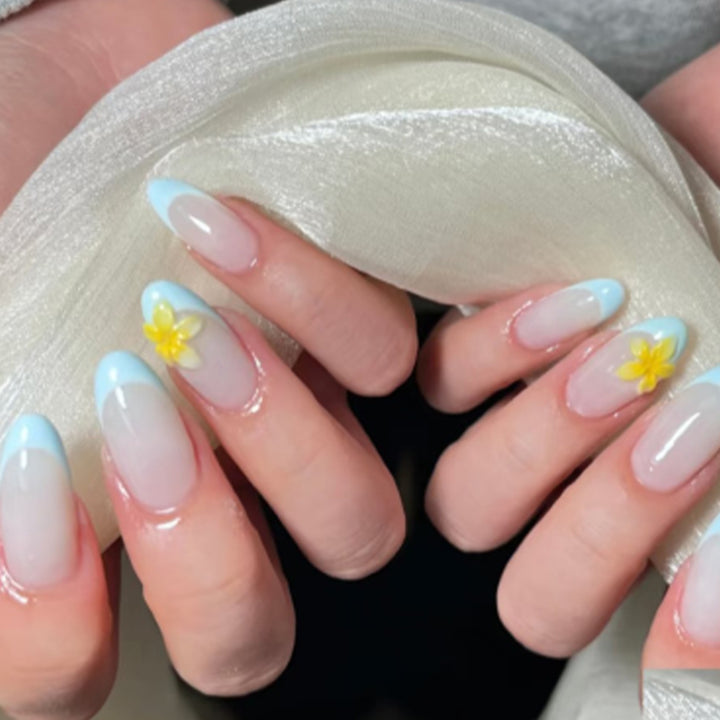 Artfully designed nail extensions with floral accent Stornfield