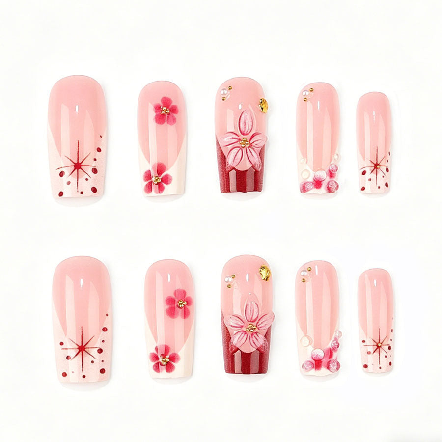Nail art set with floral 3D details and glitter accents Stornfield