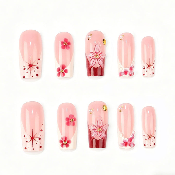 Nail art set with floral 3D details and glitter accents Stornfield