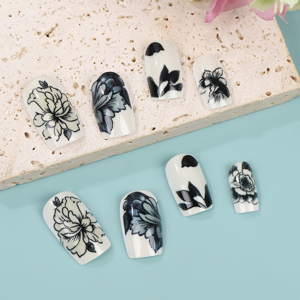 Artificial nails with floral black-and-white design Stornfield