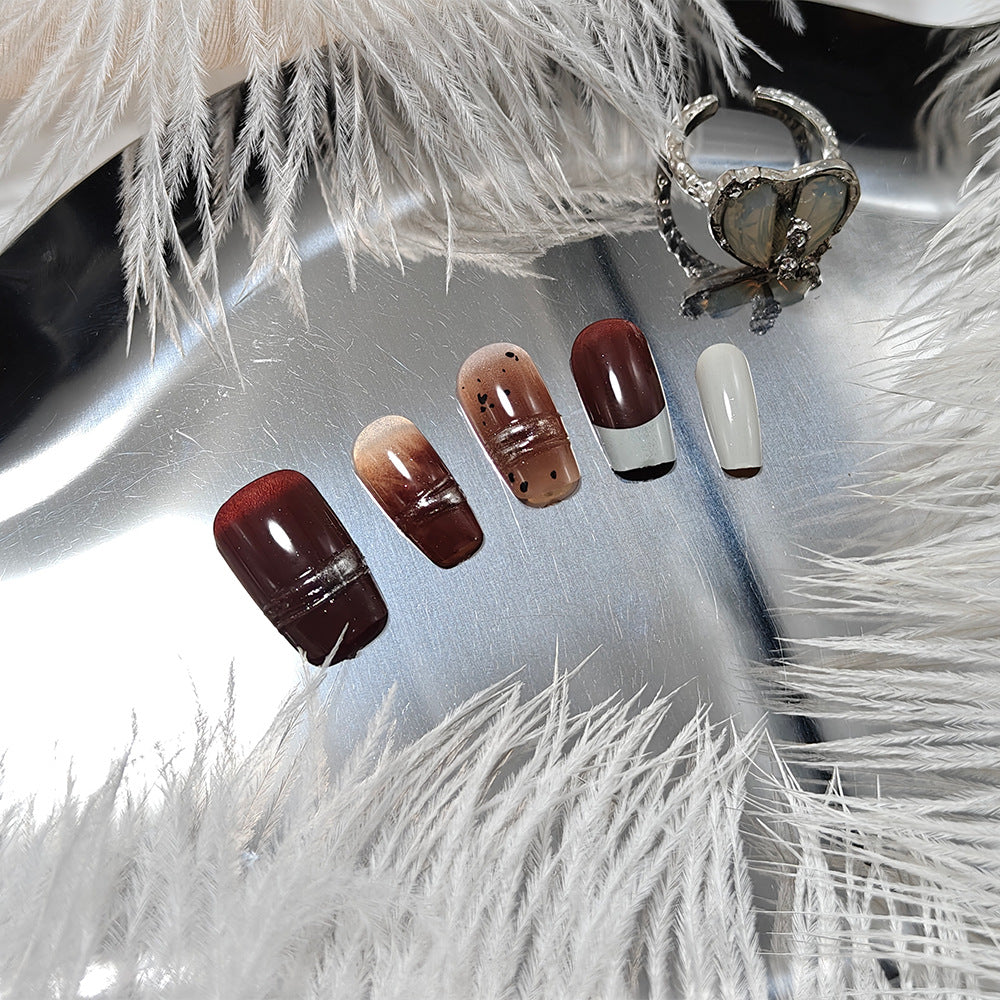 Trendy artificial nails with elegant metallic and gradient effects Stornfield