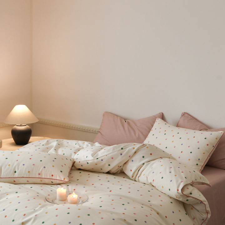 Cotton satin bed linen set with small tree print and contrast piping