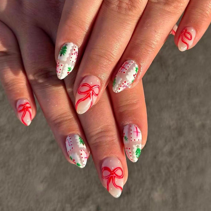 Artificial nail set with festive gift and bow motifs Stornfield