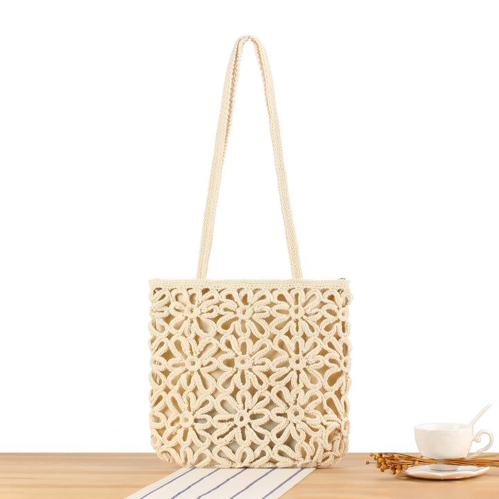 Handbag made of artistic macramé with floral details Stornfield