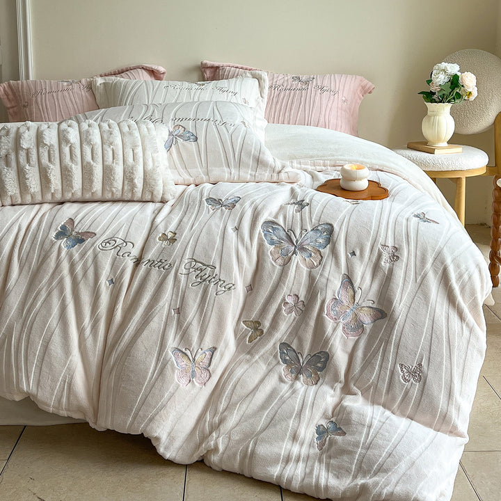 Cozy microfiber bedding with embroidered butterfly designs