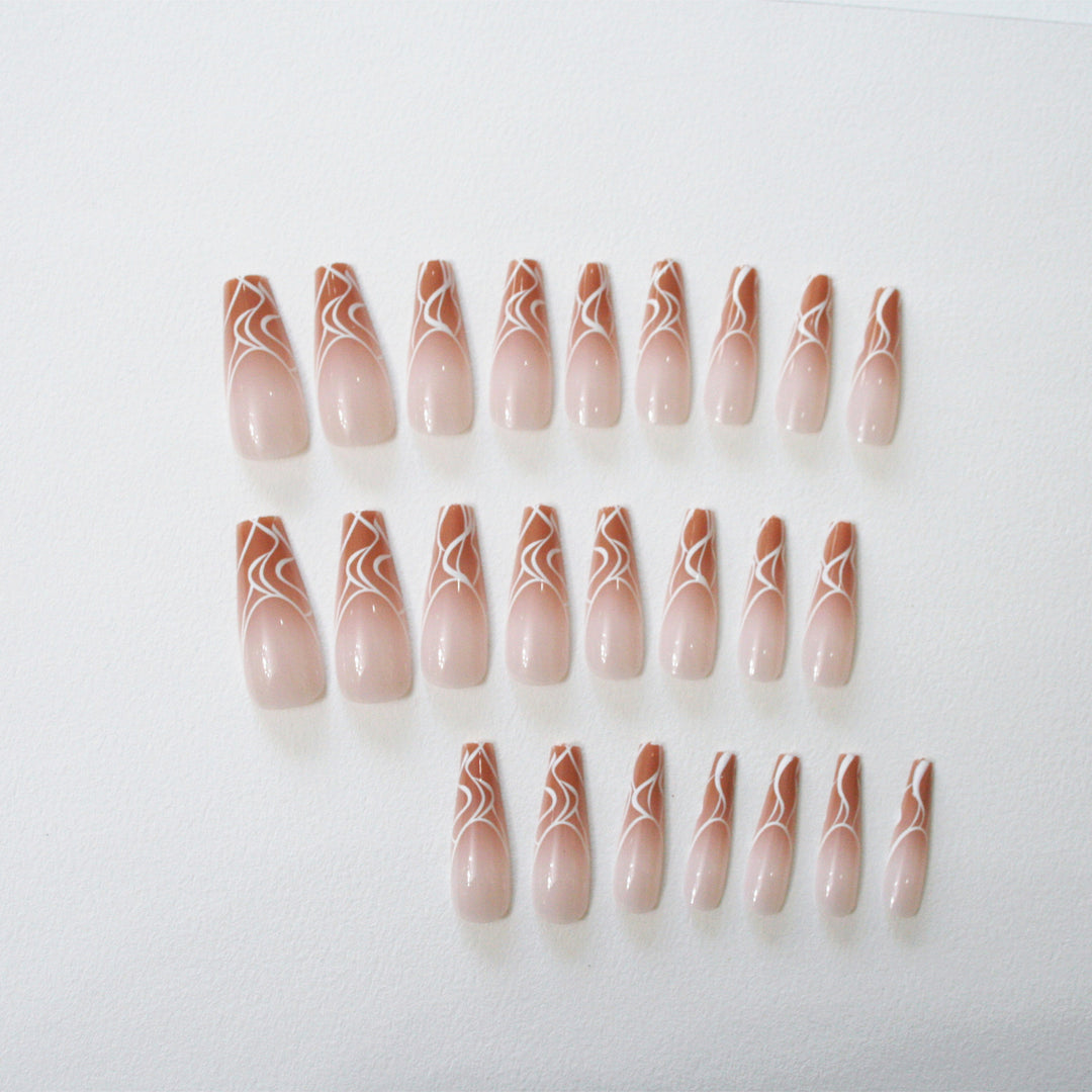 Stylish artificial nails with elegant patterns Stornfield