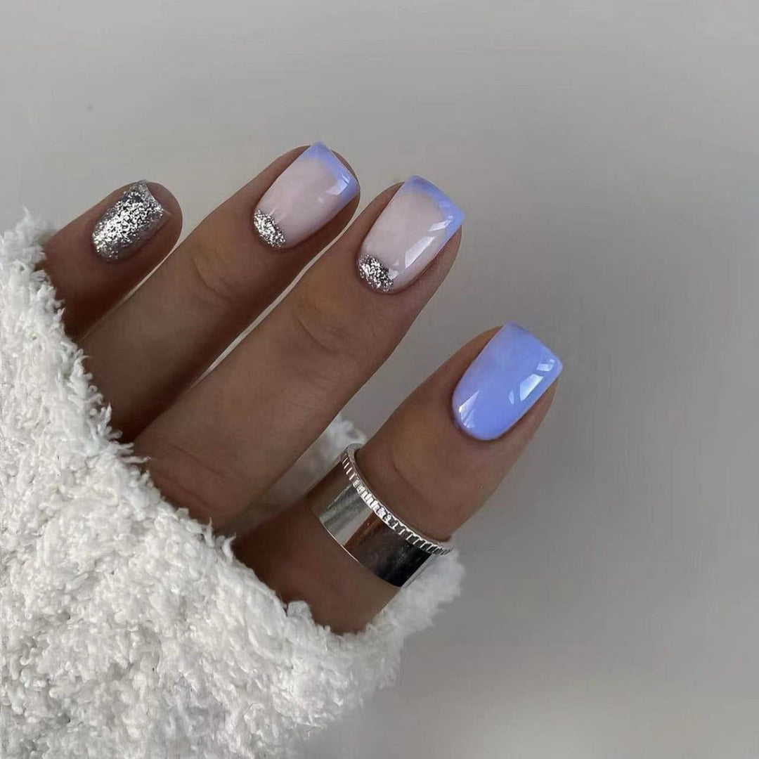Artful nail tips with glitter decoration Stornfield