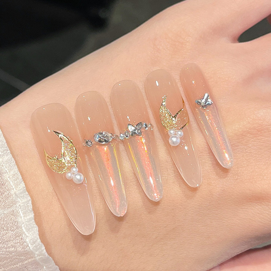 Artistic Stiletto Press-On Nail Art with Glimmering Accents Stornfield
