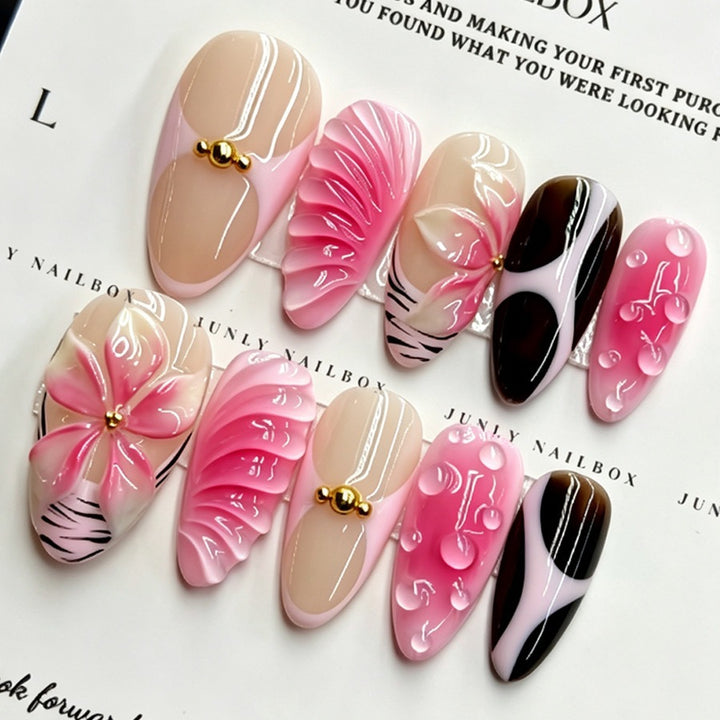 Acrylic nail set with filigree flower and glitter accents Stornfield